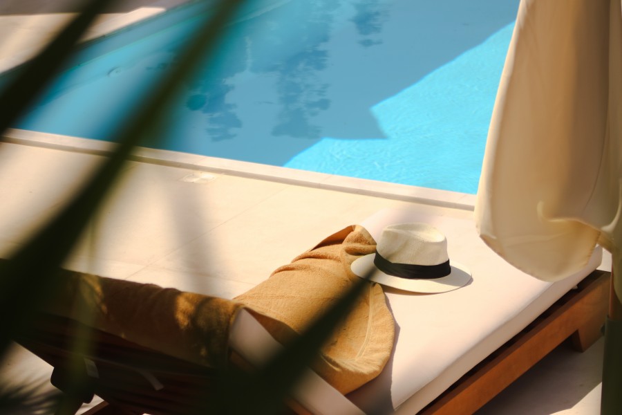 Spacious luxury villa rental in Milos with an infinity pool overlooking the Aegean Sea, offering panoramic island views.